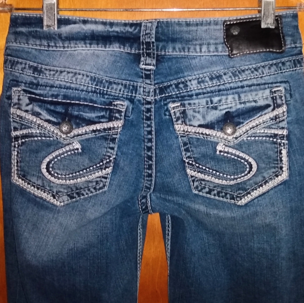 Silver Suki fluid mid-rise boot cut jeans